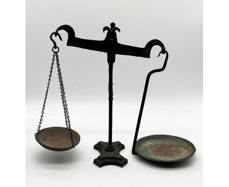 An antique set of cast iron and brass scales 