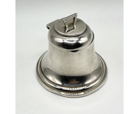 A hallmarked silver inkwell in the form of a bell with opaque glass liner, dated Birmingham 1924