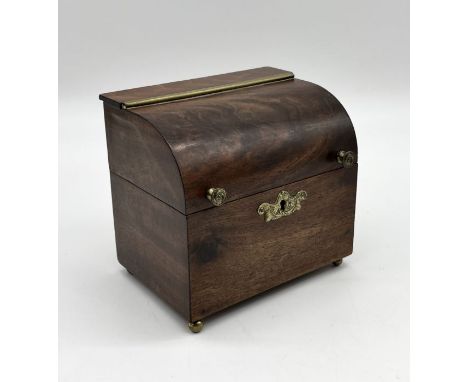 A small early 19th Century Mahogany tea caddy in form of cylinder bureau on brass feet