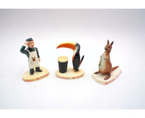 Three vintage Carlton Ware ceramic Guinness figures including a kangaroo, toucan with pint of Guinness and zoo keeper - All w