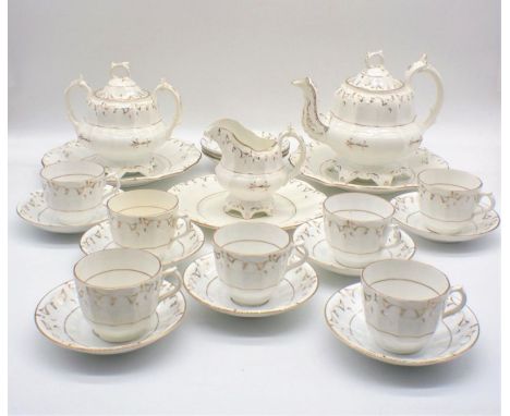 A Victorian white ceramic part tea service, with gilded decoration.