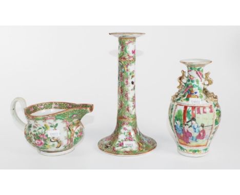 Three assorted Chinese Rose Medallion pieces comprising a candlestick (chip to base), 21.5cm high approx., a vase &amp; a jug