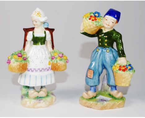 Two Royal Worcester Dutch girl &amp; boy figurine both modelled by F.Gertner, to include no.2923 and no.2922, height 14cm app