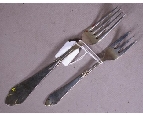 Two Christian Heise Denmark silver forks each hallmarked, maker Christian F. Heise, 1931,  with matching design to handles, i