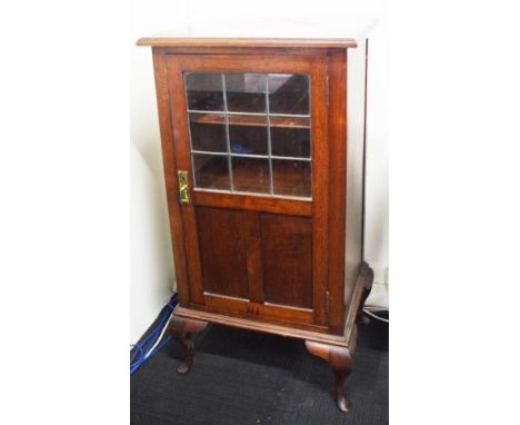 Vintage leadlight fronted cabinet leadlight door opens to shelved interior, (height 10u7cm, width 56cm, depth 45cm approx).