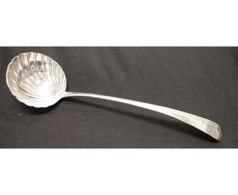 George III Irish sterling silver soup ladle with bowl of ribbed form, initialled at top of handle. 35cm length. Hallmarked Du
