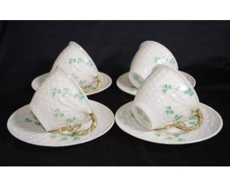 Four Belleek teacups &amp; saucers second version green marks to bases.