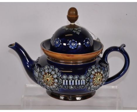 Doulton Lambeth stoneware teapot with metal acorn finial.