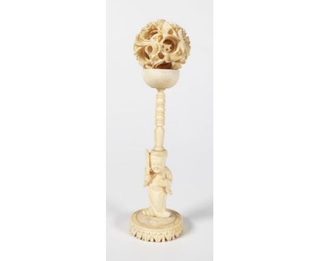 Antique Chinese ivory puzzle ball with carved figural stand and dragon ball, C1930s,height 12cm approx,This item may not be e