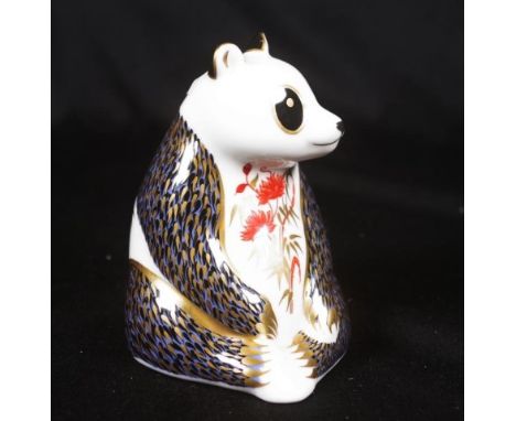 Royal Crown Derby Panda paperweight marked to base and with gold button, (height 10cm approx).