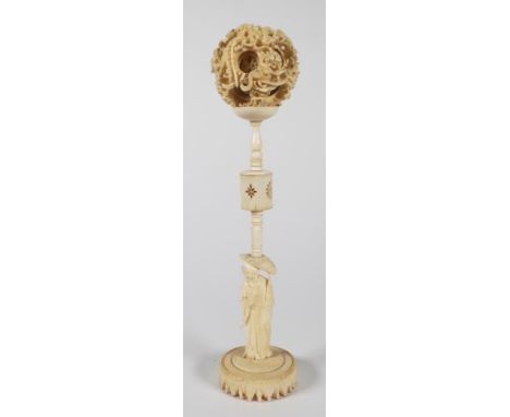Antique Chinese ivory puzzle ball with carved figural stand and dragon ball, C1930s,height 26cm approx,This item may not be e