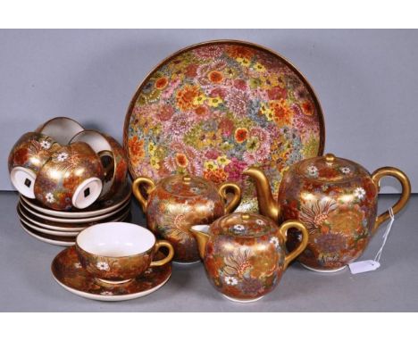 Japanese Satsuma teaset comprising teapot, sugar, creamer, plate, 5 cups &amp; saucers &amp; extra saucer, signed base