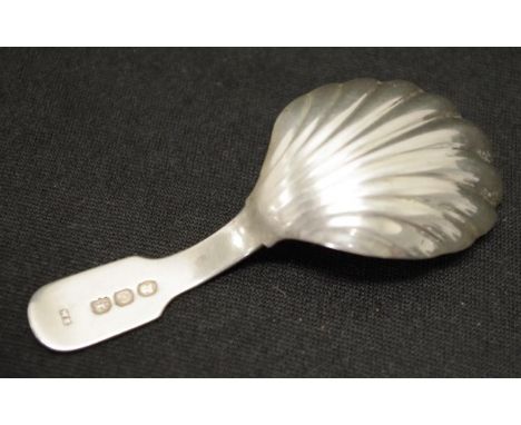 George III sterling silver caddy spoon London 1818, maker (possibly William Knight, marks rubbed), crested. (Weight 14grams a