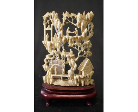 Antique Chinese carved ivory village scene mounted on a timber stand, This item cannot be exported, 13cm high approx.