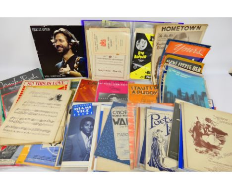 Lot to include vintage sheet music, Eric Clapton concert programme and other. [W]
