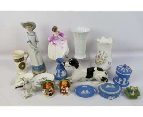 A collection of mixed ceramics to include Wedgwood Jasperware, Royal Doulton, Aynsley, Nao and similar, largest piece approxi