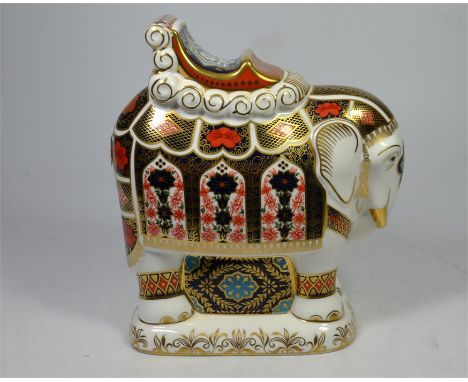 A Royal Crown Derby large elephant paperweight, Imari decoration with silver stopper (seconds). Height 20.5cm.