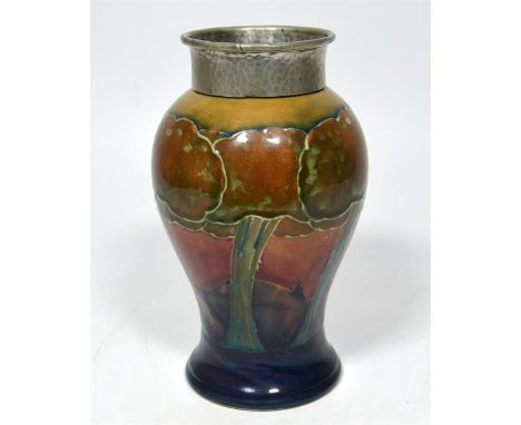 A William Moorcroft 'Eventide' vase, with a  tudric pewter top, circa 1925. Signed William Moorcroft and impressed marks. Dia