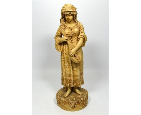 A Robinson & Leadbetter figure of a young girl playing a lute. Impressed R & L to rear. Circa 1880. Height 40cm.