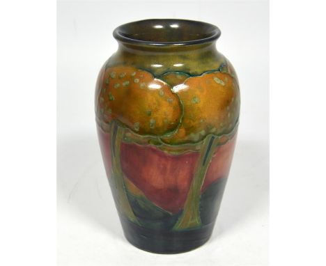 A William Moorcroft 'Eventide' vase, circa 1920. Signed William Moorcroft and impressed marks. Height 16cm.