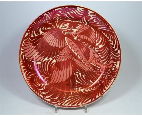 A William De Morgan ruby lustre charger, decorated with an eagle amongst foliage, ruby lustre foliage to verso. Circa 1880, d