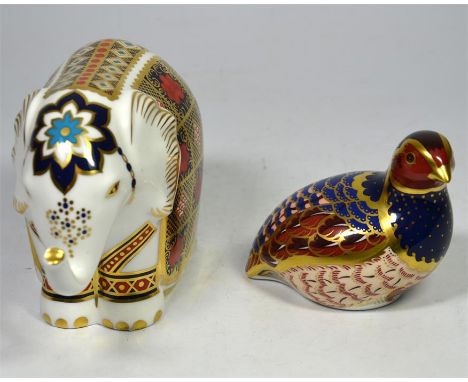 A Royal Crown Derby small elephant paperweight, Imari decoration with silver stopper (seconds). Height 9.5cm. Also a Royal Cr