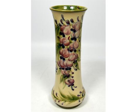 A William Moorcroft for James Macintyre, 'Wisteria' vase, circa 1910. Signed William Moorcroft. Height  24cm.