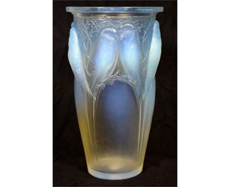 A Rene Lalique opalescent with blue staining glass 'Ceylan' vase, circa 1924. Signed R. Lalique France. Height 23.5cm.