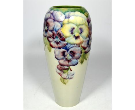 A William Moorcroft for James Macintyre, 'Pansy on white' vase, circa 1910. Signed William Moorcroft. Height 26cm.