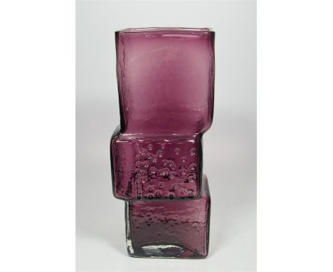 A large Whitefriars drunken bricklayer vase, aubergine coloured, designed by Geoffrey Baxter. Height 34cm.