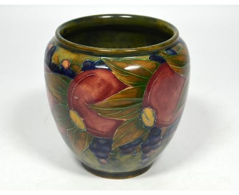 A William Moorcroft 'Pomegranate' vase, circa 1914. Signed William Moorcroft. Height 12cm.