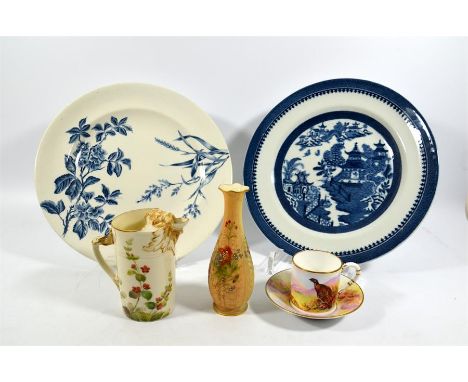 Five pieces of Royal Worcester including two blue and white plates, a blush vase, a jug and a cup and saucer. Some damages. H