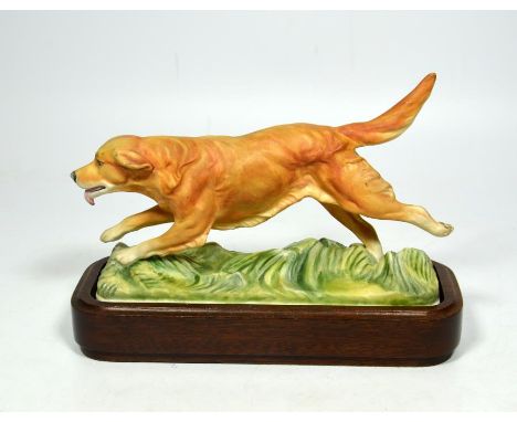 A Royal Worcester figure of a Golden Retriever, circa 1975, modelled by Doris Linder, printed marks to base. Height 15cm.