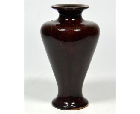 A Royal Doulton vase with speckled glaze, circa 1910. Impressed marks. Height 15cm.