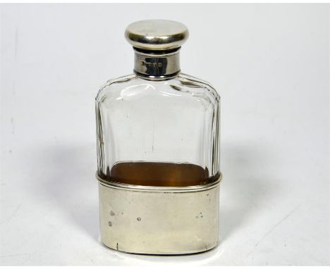 A silver and glass hipflask. London 1922. Height 12cm.