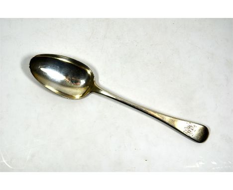 A Georgian silver serving spoon, makers mark SH, London 1802. Length 22cm, approx 61 grams.