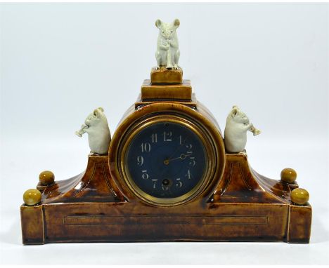 A Doulton Lambeth George Tinworth clock featuring three mice playing instruments, circa 1885. Impressed marks to rear. Height