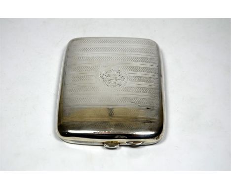 A George V silver cigarette case, decorated with a crest, by Samuel M Levi, Birmingham 1922. Height 11cm, width 8cm, approx 1