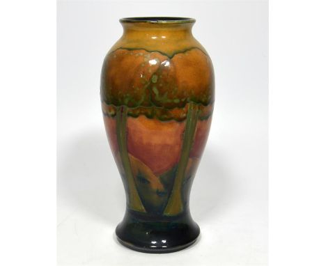 A William Moorcroft 'Eventide' vase, circa 1923. Signed. Impressed marks. Height 23cm.