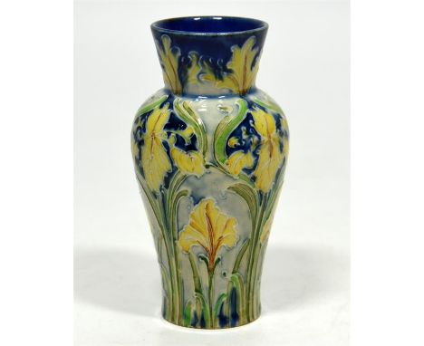 A William Moorcroft for James Macintyre, 'Florian Iris' vase, circa 1900. Signed William Moorcroft. Height 11cm.