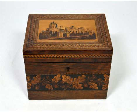 A walnut Tunbridge ware tea caddy with a view of Eridge Castle, circa 1870. Height 11.5cm.