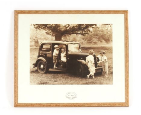Caroline Arber, photographic print depicting children playing in an old car