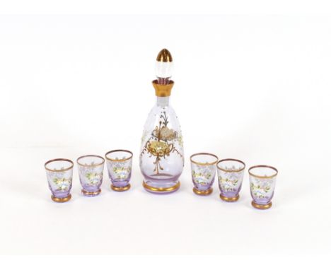A cranberry glass cream jug; a pink tinted gilt and enamel decorated glass liqueur set; various coloured glass vases etc. (20