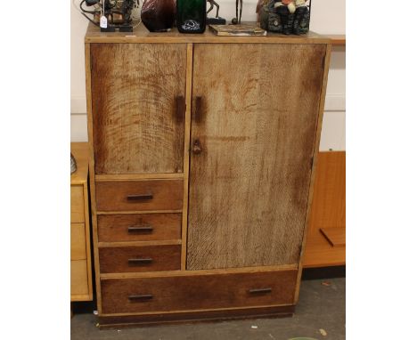 A Heals style light oak compactum wardrobe, 91cm wide x 130cm high