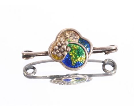 A small Charles Horner silver and enamel brooch, with foliate scroll decoration