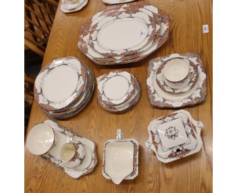 A Crown Ducal "Orange Blossom" decorated part dinner / tea service