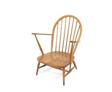 An Ercol low stick back armchair