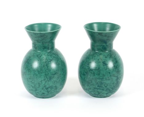 A pair of green glazed Poole pottery style baluster vases, 20cm high