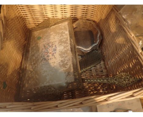 Basket of dressing table items including tray and clock