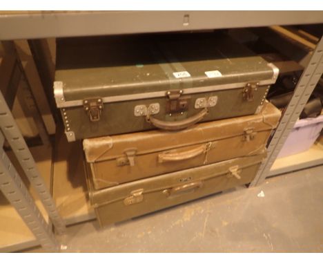 Three vintage suitcases